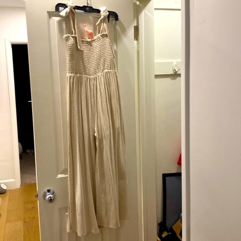 Lifestyled Co lined linen romper with shoulder ties, size medium
